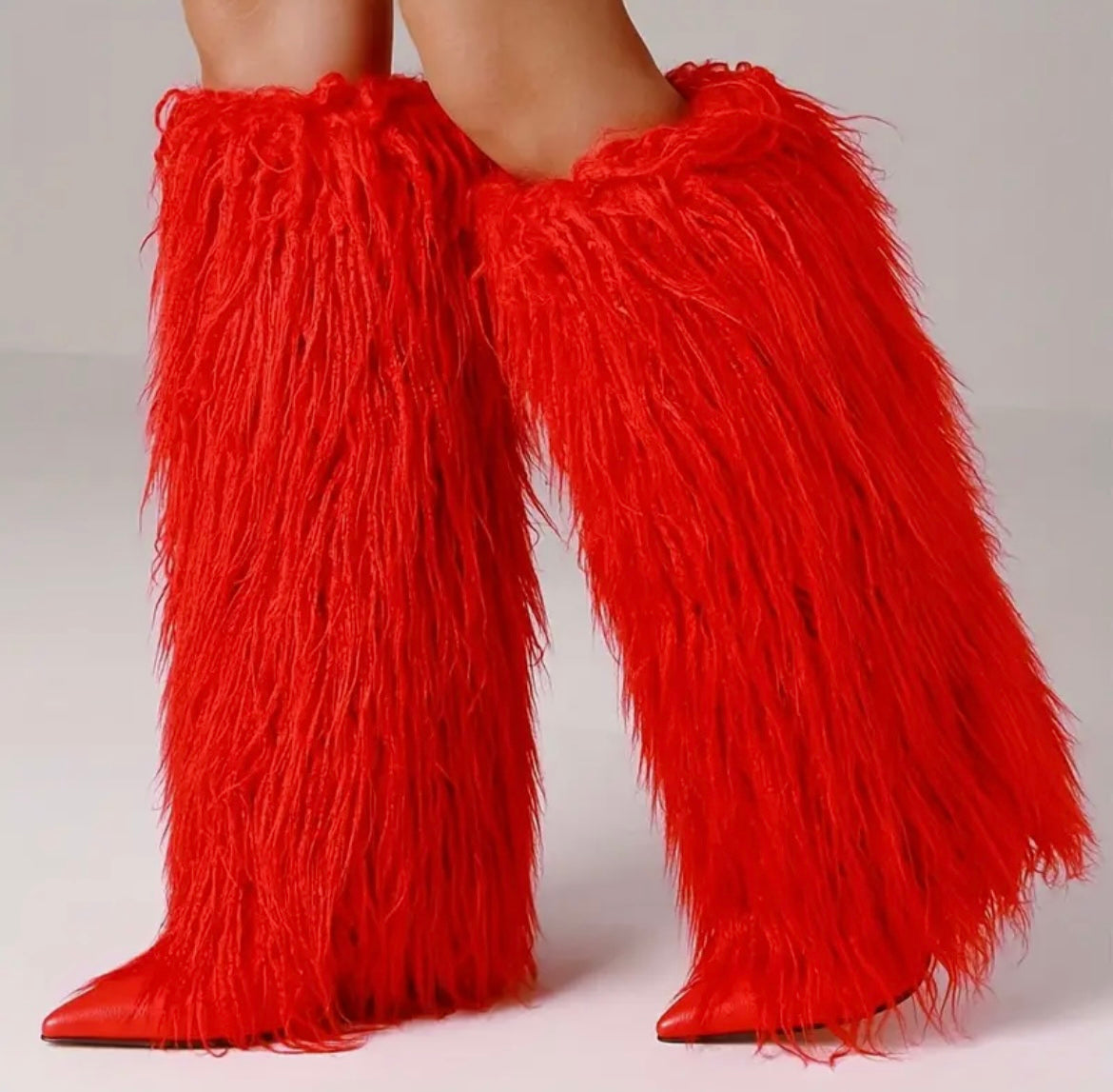 “Kinky Kurly” red stiletto fur boots