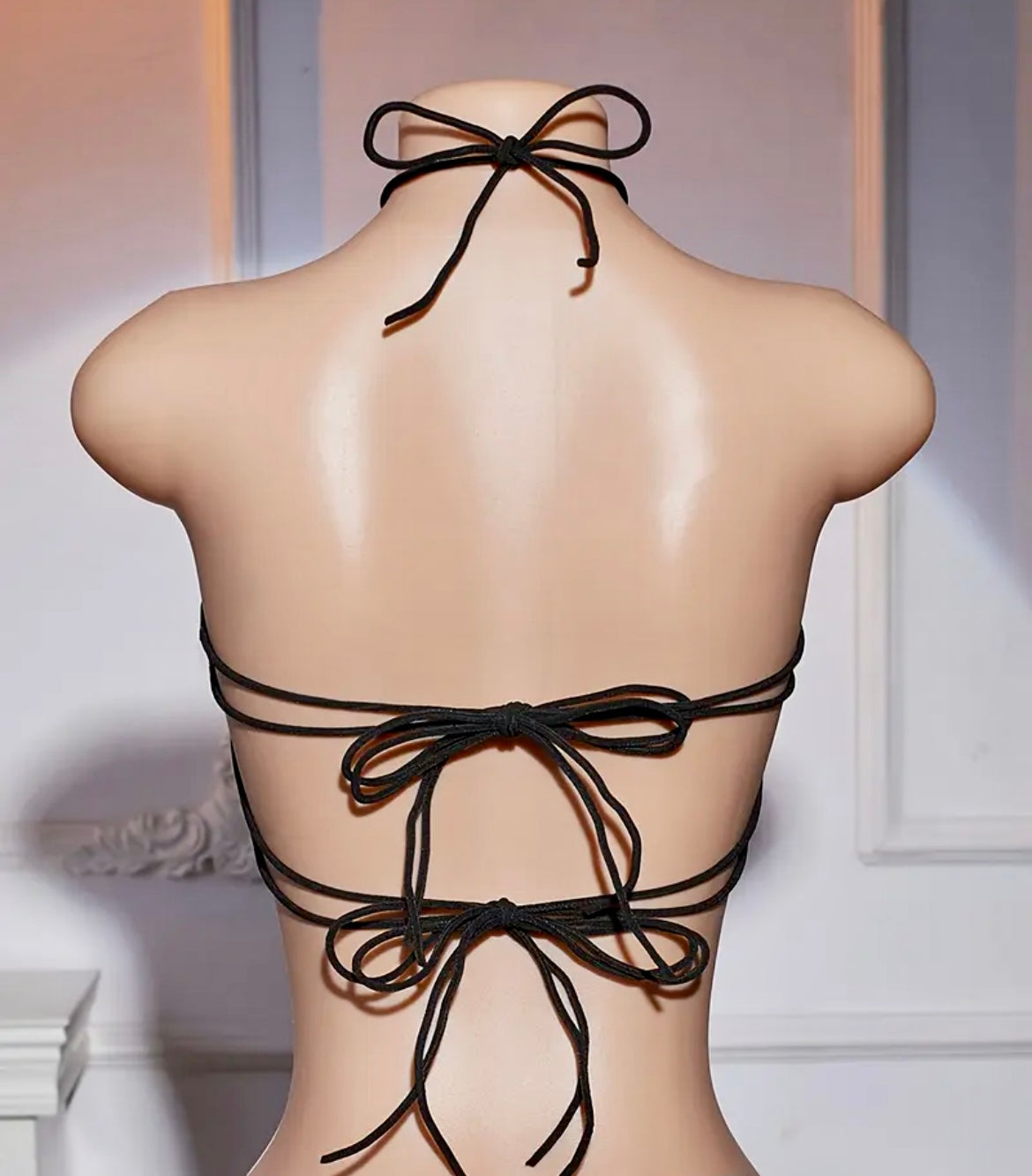 “Crossed Me” black leather top