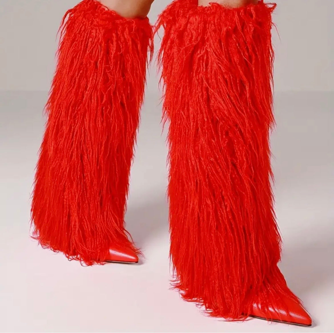 “Kinky Kurly” red stiletto fur boots