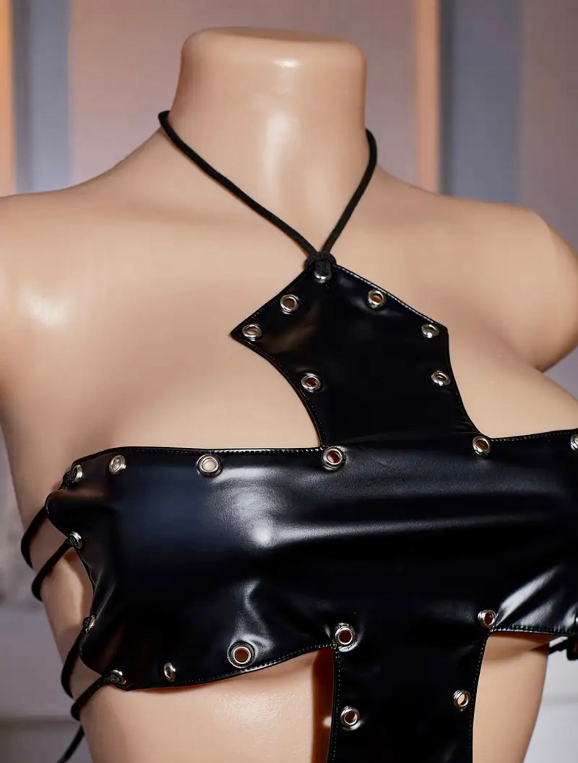 “Crossed Me” black leather top