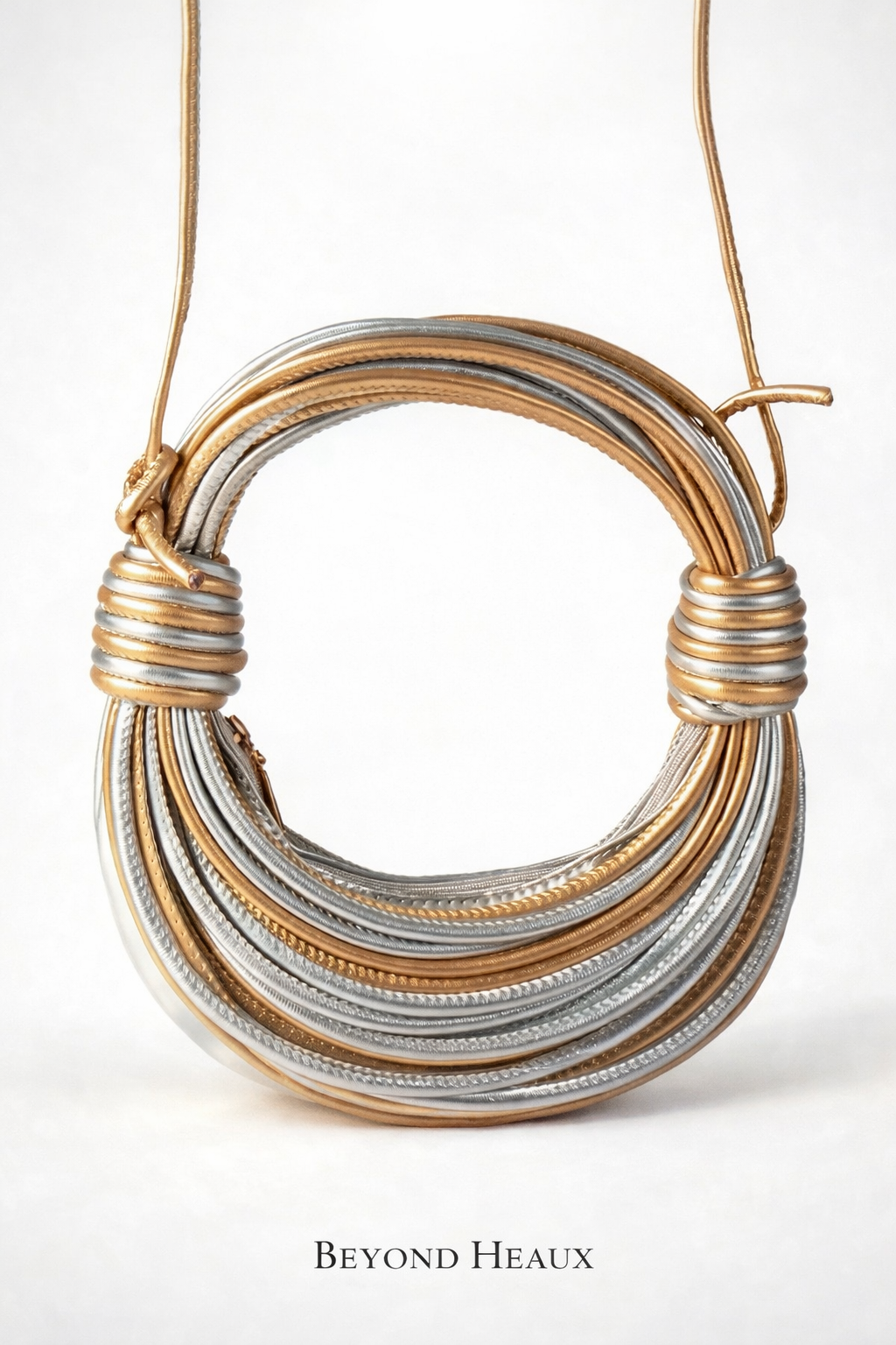 “Coil Statement Bag” silver & Gold